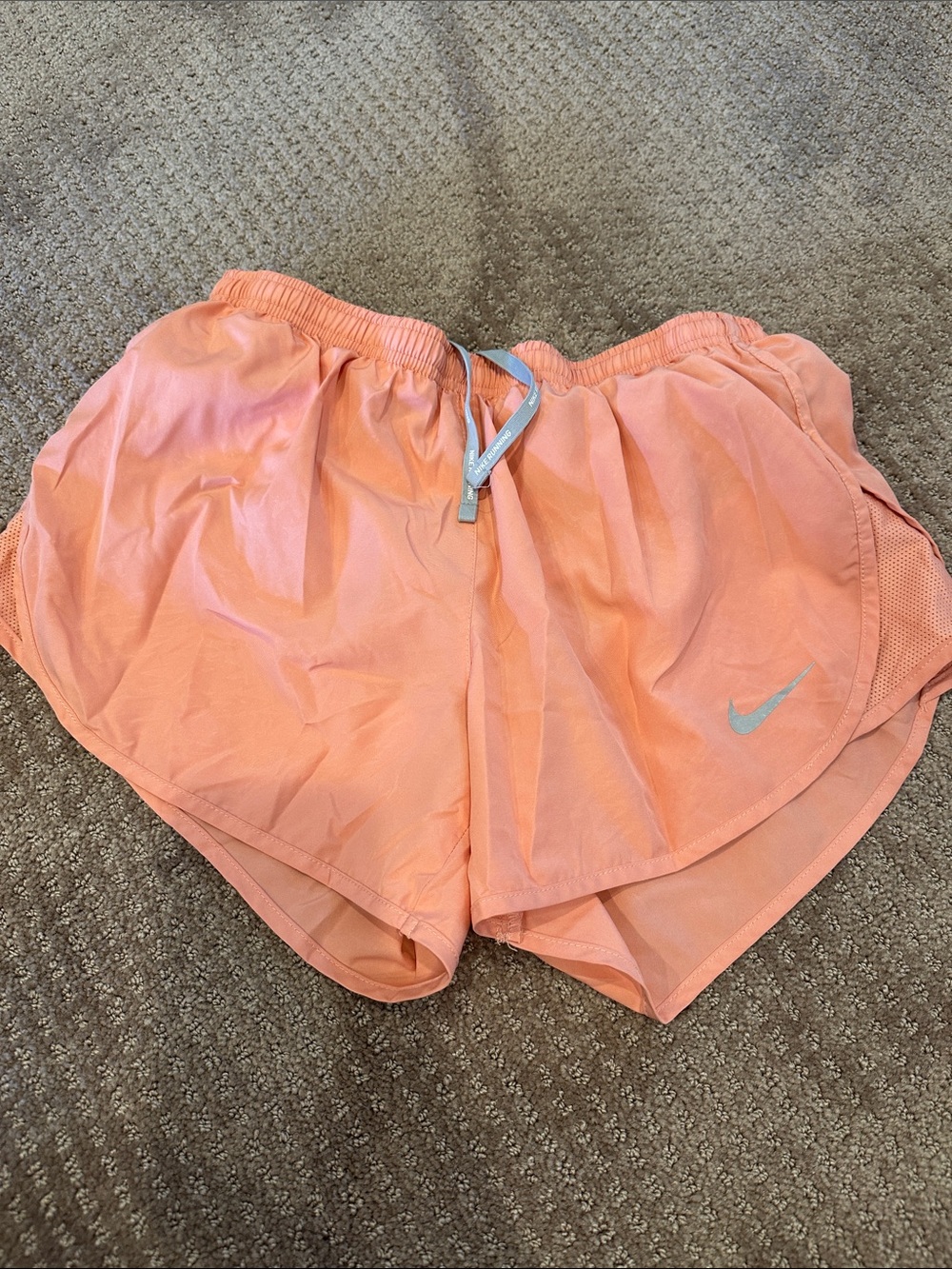 Nike Women's Peach Athletic Running Shorts with Silver Swoosh